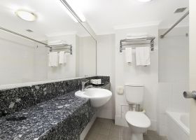 Queen Studio Apartment Bathroom - The Wellington Apartments Hotel Brisbane